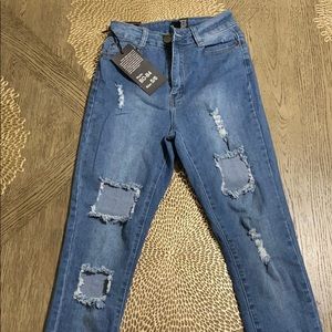 Distressed Blue Jeans